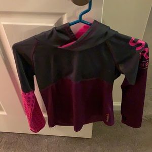 Long sleeve, hooded shirt.